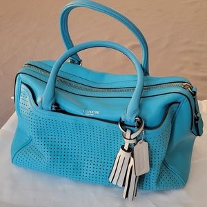 Coach purse. Unique blue color and leather design.